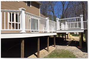DECK BUILDER - THIBAULT'S RENOVATIONS - ...We installed all new gray Azek deck boards, white Azek Premier Railings, and white Azek trim boards...