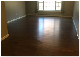 REMODEL FLOORING - Installed a free floating laminated wood floor in this NH condo.
