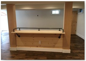 Basement renovation with newly added bar